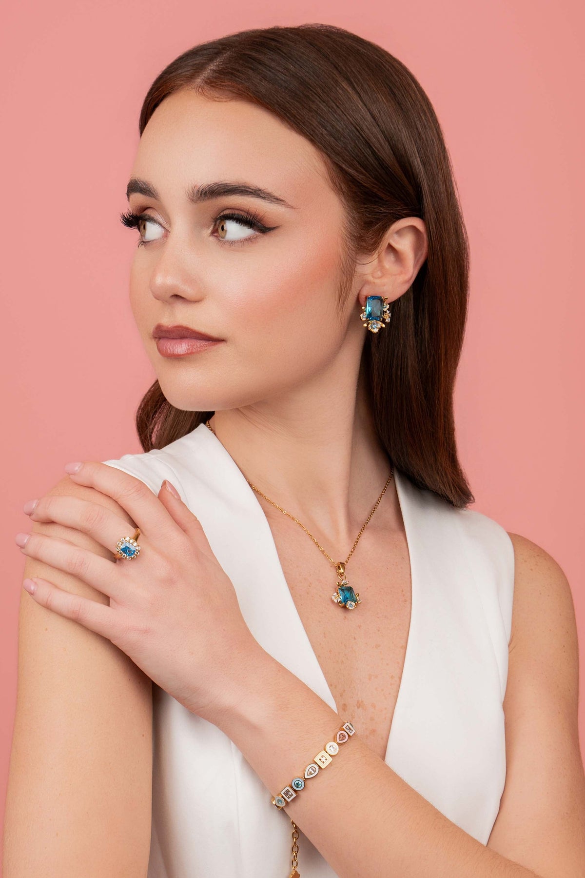 Model wearing Pimpernell Blu Reġina Necklace, Pimpernell Blu Reġina Stud Earring Set