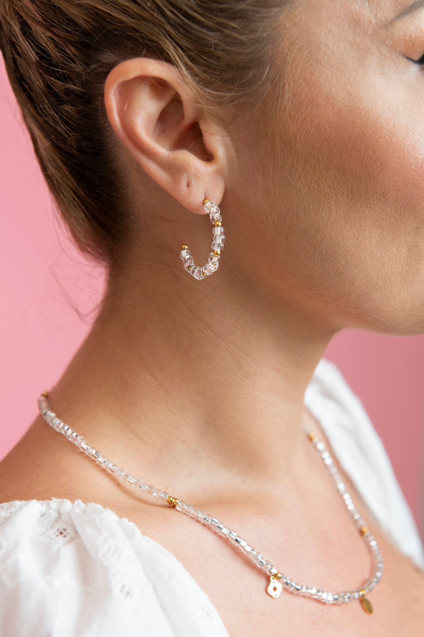 White beaded store hoop earrings