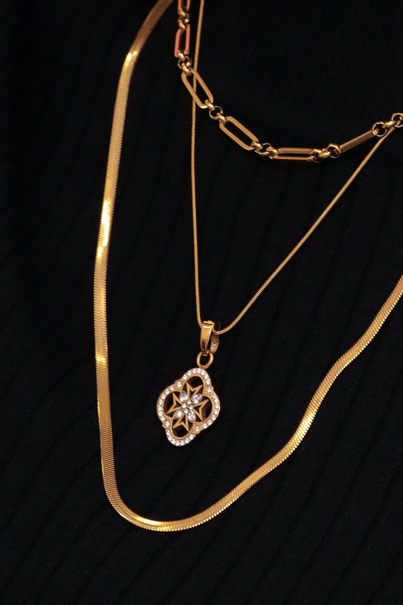 Quad Crystal Maltese Cross Pendant