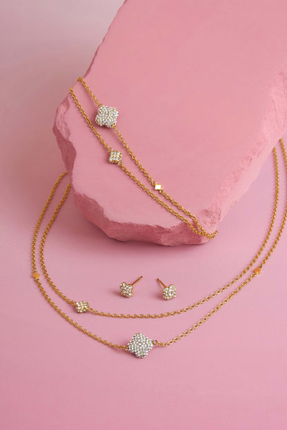 Rossi jewellery featuring the Carisma logo, displayed on pink blocks
