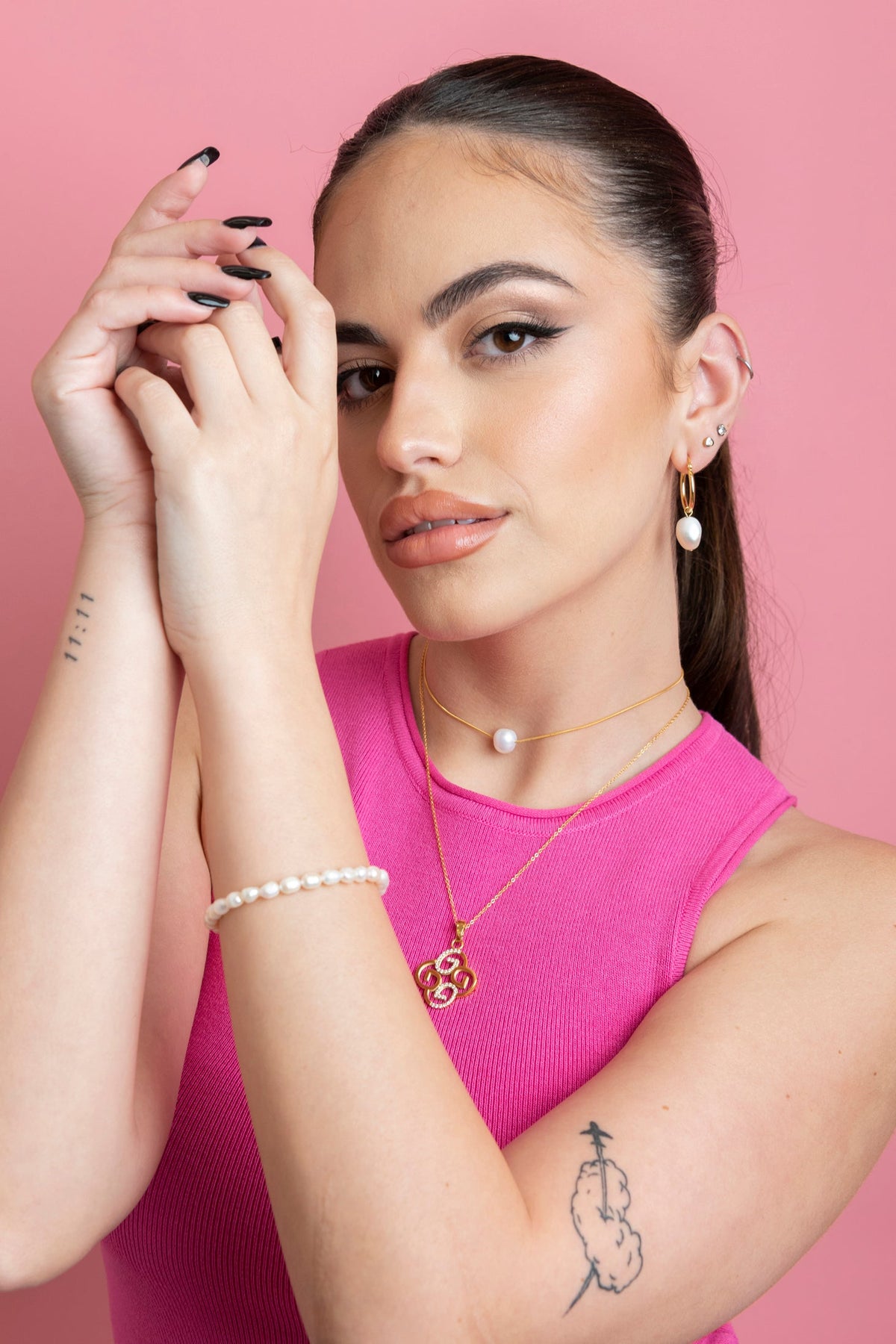 Model wearing Dara’s Freshwater Pearl Bracelet