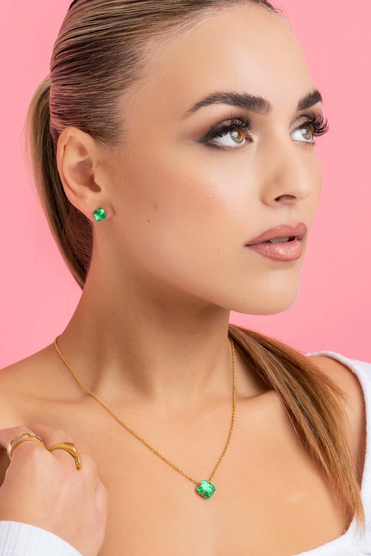 Model wearing August Logo Birthstone Stud Earring Set