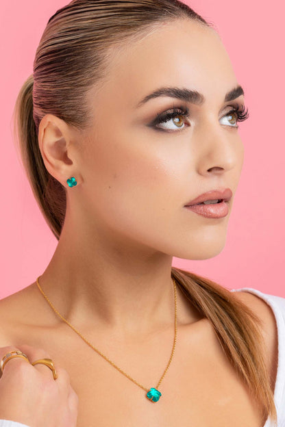 Model wearing May Logo Birthstone Stud Earring Set