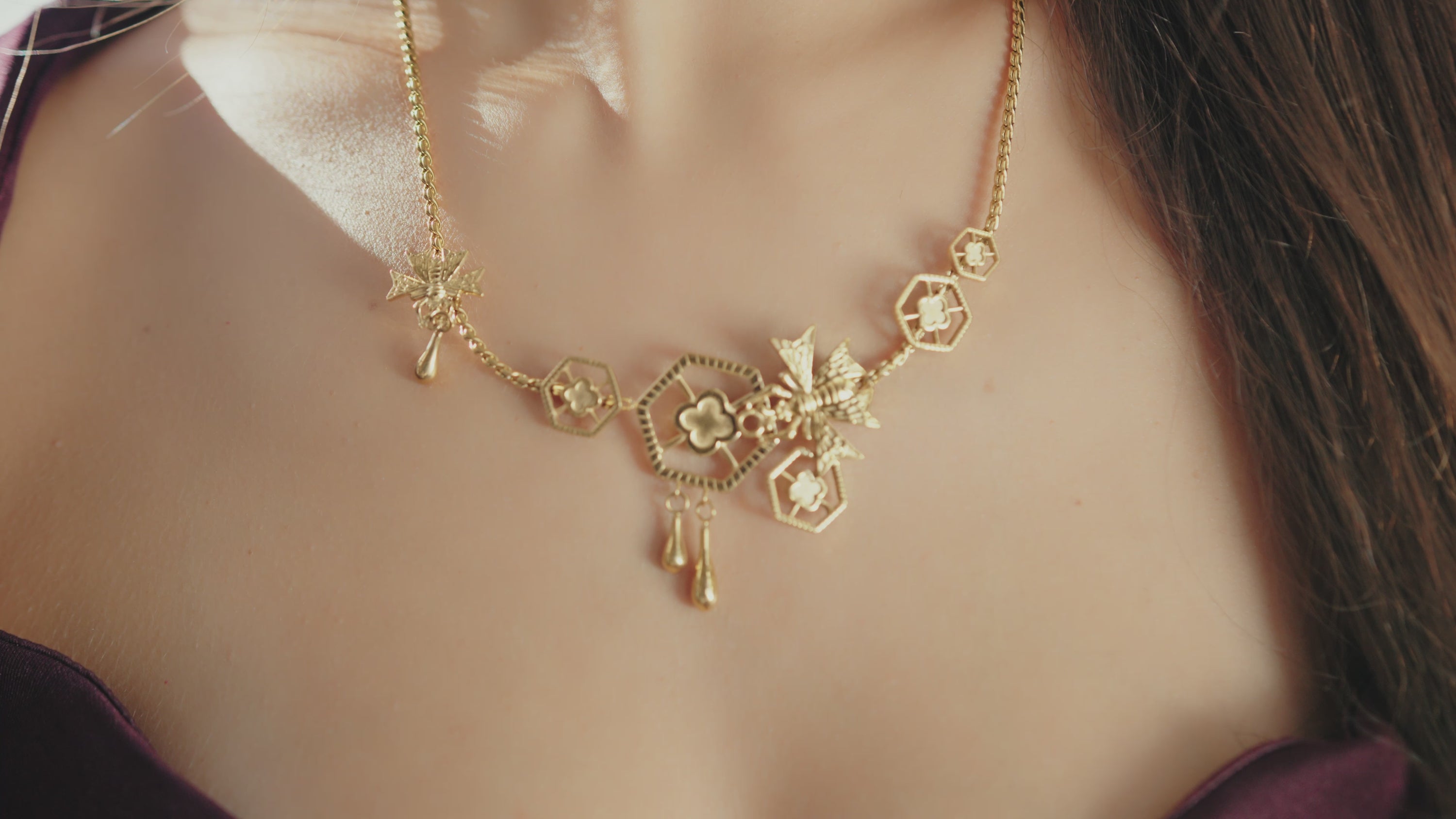 Reġina Gold Carisma Logo Statement Necklace